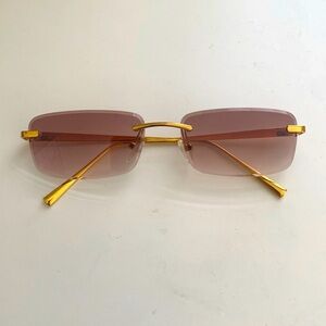 Brown and gold narrow frame rectangle sunglasses